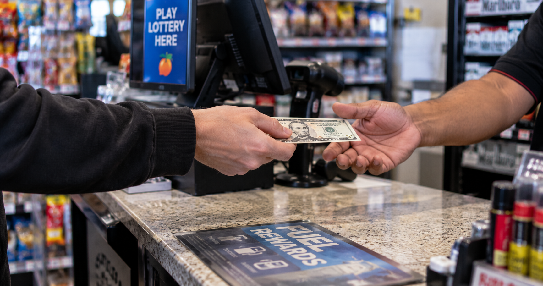 A Tampa gas station owner allegedly told an undercover lottery agent a $1,000 winning ticket was worth $5